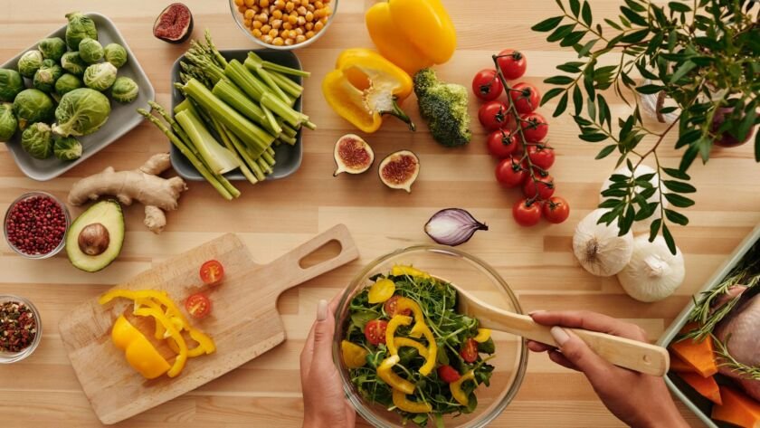 fresh vegetables on brown wooden table